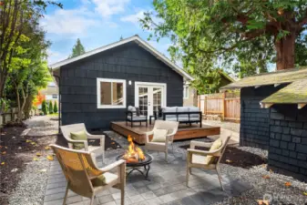Looking back towards the large deck the garage with extra shop space is off to the right.