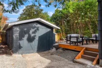 The detached garage features a bonus area off to the right for great storage or shop space.