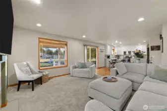 Enjoy the picturesque country views from wood wrapped windows throughout.