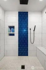 Lavish primary walk in shower boast 2 shower heads with added rain shower overhead and high pressure detachable wand.