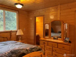 upper primary bedroom with half bath