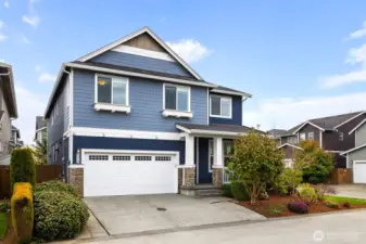 2 car garage, 2 additional spots in the driveway plus additional guest parking close by