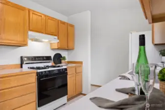 There is a lot of cabinet and counter space in the kitchen.