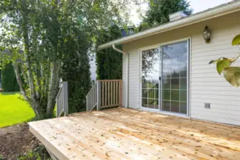 THe new back deck is just off the dining room and looks onto what was and is soon to be, a golf course.