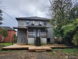 Back of duplex with parking area