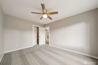 Bedroom # 4 overlooks the front of the home & features a walk-in closet.