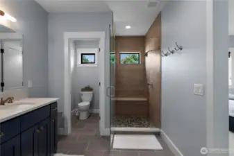 Primary Suite bathroom with plenty of space and beach colors!
