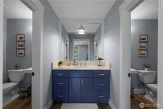 Double bathroom with two 3/4 baths. Cool design and sufficient for multiple people.