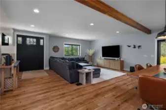 Features 9' ceilings, wood beams & slider to the Hot tub area!
