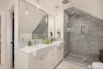 Primary bath with double sinks, in-floor programmable heating, and gorgeous marble throughout!