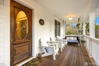 Inviting front porch with Batu decking greets you as you approach the home.