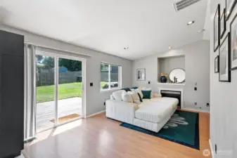 Access the patio and backyard through the sliding glass door