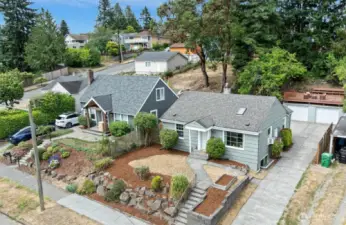 The property extends all the way to the alley in the back of the garage!