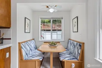 A cozy banquette area where everyone likes to gather makes for a great atmosphere around dinner time, or just enjoy your morning coffee here!