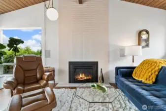 New custom gas fireplace is a fabulous statement in this room.