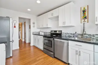 Lots of cabinets and counter space here