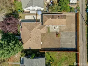 Composition roof, level lot, and fenced back yard with alley access
