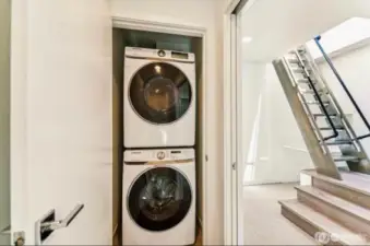 Stackable Wash/Dryer next to master bedroom.