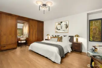 Primary features the original sleek closet design: featuring rich, natural woods, functional and minimalist design + flat panel doors. Gorgeous!