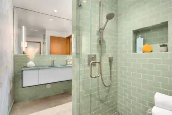 Not to be outdone by the primary bathroom, this too features gorgeous imported tiles + Italian vanity.