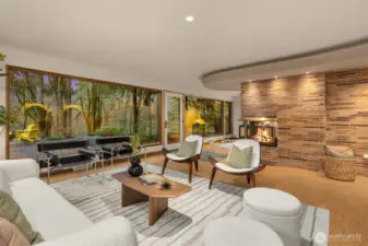 Floor to ceiling steel windows, stunning fireplace and mood lighting.