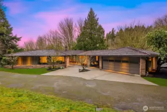 Spectacular 1 level with daylight basement home, enveloped in a 1.3 acre private oasis...