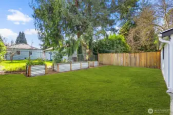 Every corner of this property has been loved and the soil of these beds is the most nutritious and ready for you to grow your own garden!