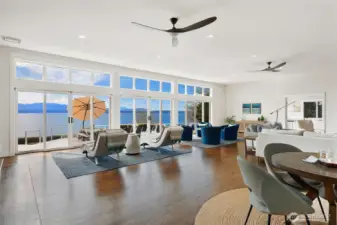 Generous living area with recreational space just beyond.