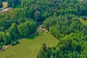 No visible signs of neighbors when on the property, aerial photo only able to locate one.