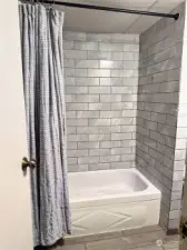 Updated Main bath tile tub