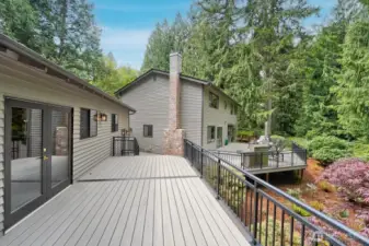 Azek decking w/black powder coated railing off game room