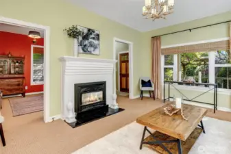 Living room has a gas fireplace.