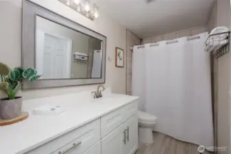 Upper level remodeled full bathroom.