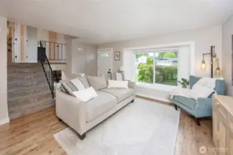 Charming family room with newer vinyl plank floors.