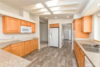 Kitchen with bedroom hallway & utility room