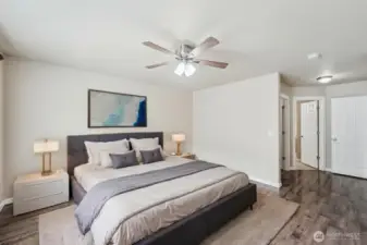 Primary suite features a large walk-in closet and spacious en suite.