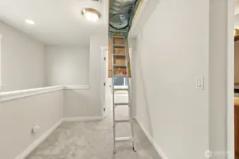 One of many upgrades.  Pull-down ladder and insulated attic hatchway cover.