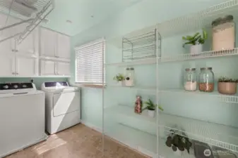 Spacious laundry room/pantry conveniently located off kitchen.