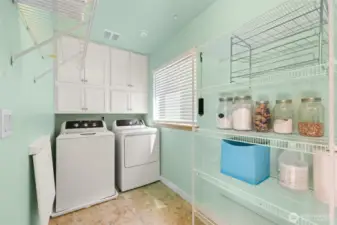 Roomy laundry pantry/laundry room just off kitchen.