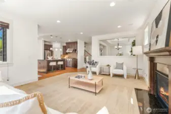 View from the family room to the kitchen, and dining room