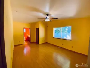 Primary suit has walk-in closet and vaulted ceiling with 5-piece bathroom.
