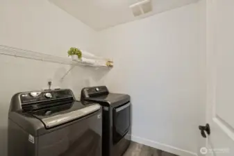 Laundry room is conveniently located upstairs