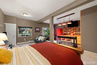 The open-concept layout of the daylight level is designed for comfort and versatility. Enjoy casual seating, room for media or gaming, and an easy flow out to the patio for seamless indoor-outdoor living.