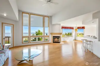 Great room with a view pointing towards the dining room and kitchen with bar seating if wanted
