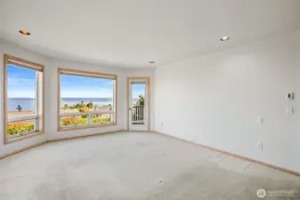 Primary bedroom with a view. King size bed easily fits with room to spare.