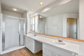 Primary bathroom with double vanity shower and huge soaker tub