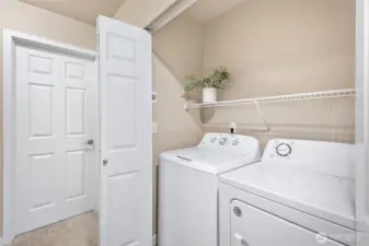 Laundry closet upstairs right next to primary bedroom.