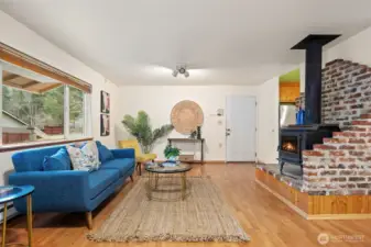 Cozy fireplace great for those chilly evenings and easy access to attached garage & Laundry