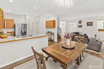 Dining room, kitchen, and living room.