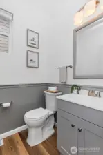 1/2 half bath as you enter home from garage.